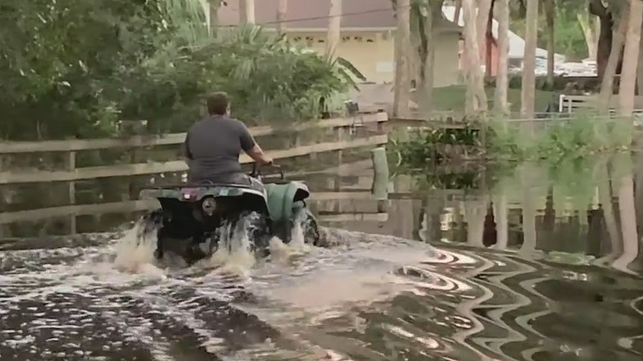 Flooding on major Seminole County road forcing residents to get around by boat, ATV's
